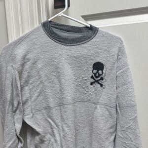 SoulCycle irreversible sweater